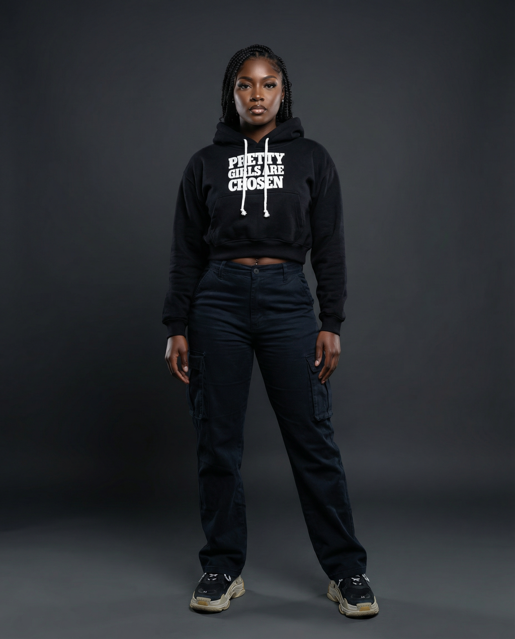 Girl wearing black cropped BAHAR "Pretty Girls Are Chosen" hoodie.